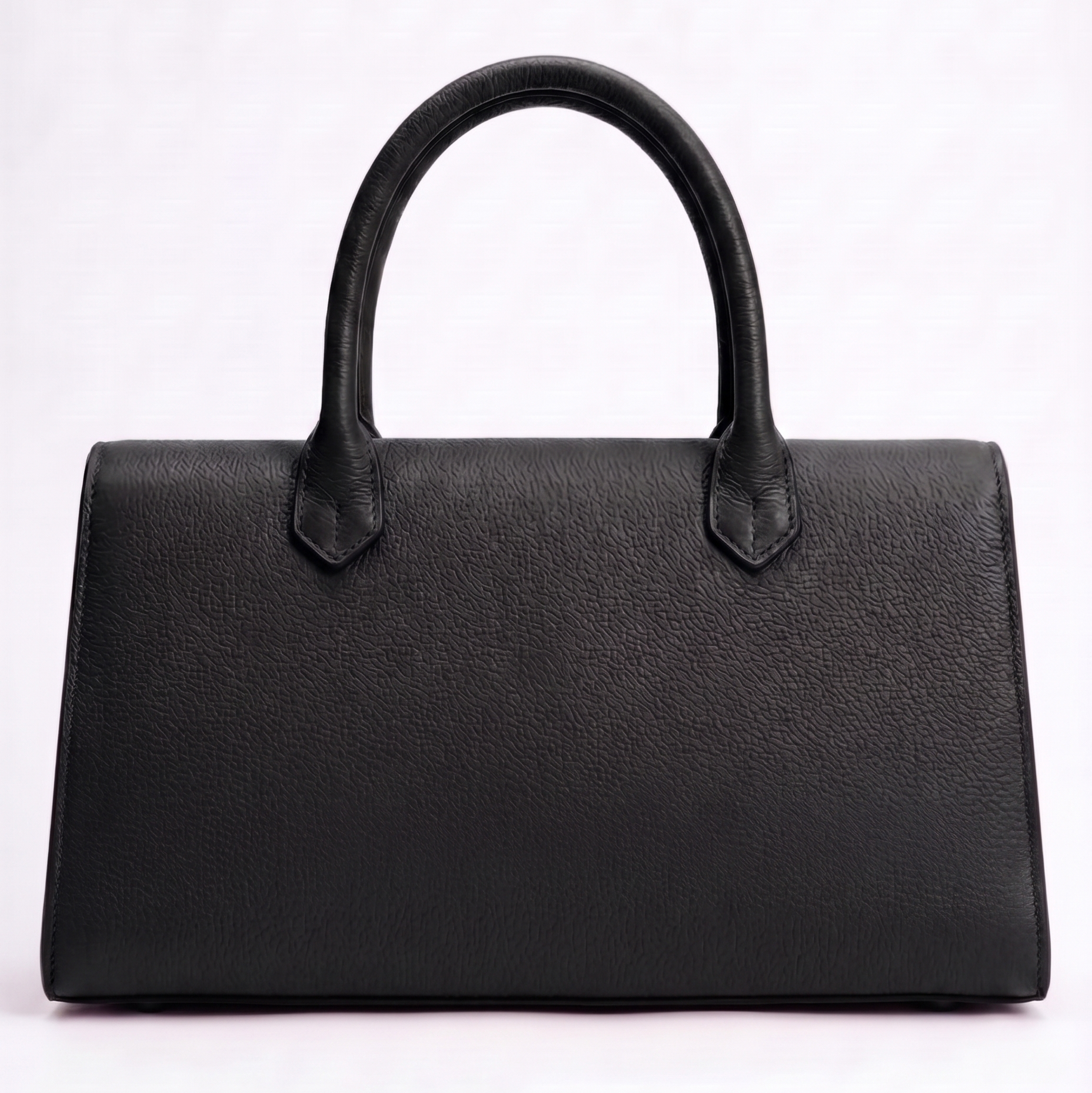 Black handbag on a white background